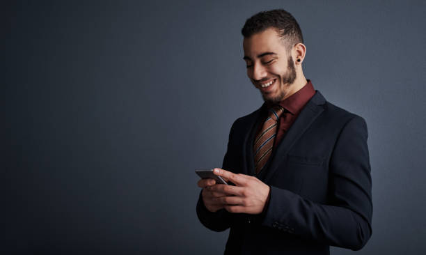 istock Good news always makes him smile 871498518