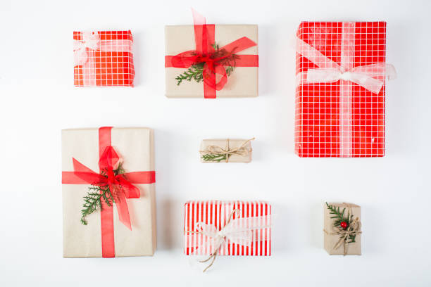 istock Christmas composition. Gift, christmas decoration, cypress branches, pine cones on white background 871501684