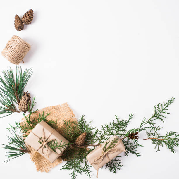 istock Christmas composition. Gift, christmas decoration, cypress branches, pine cones on white background 871501704