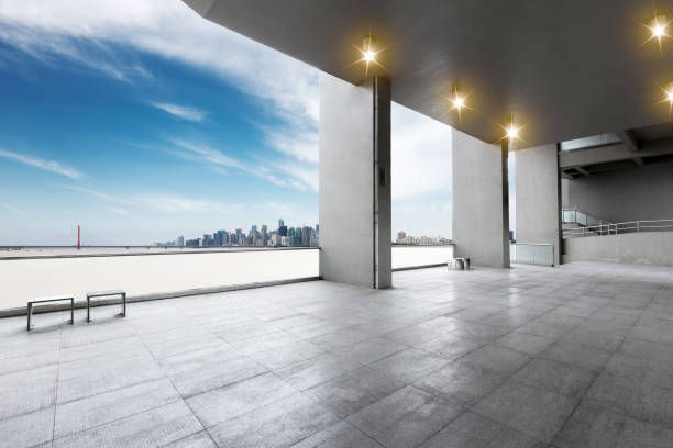istock empty marble floor with modern bridge and buildings 871501914