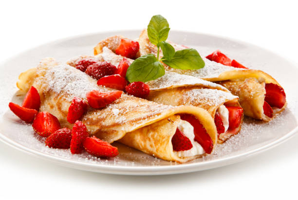 istock Crepes with strawberries and cream 871502164