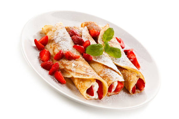 istock Crepes with strawberries and cream 871502178