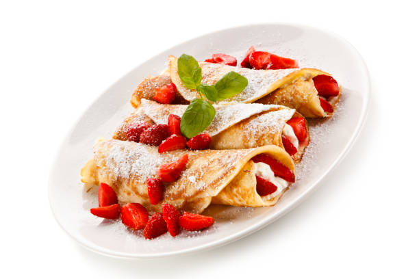 istock Crepes with strawberries and cream 871502218