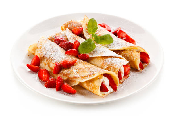 istock Crepes with strawberries and cream 871502272