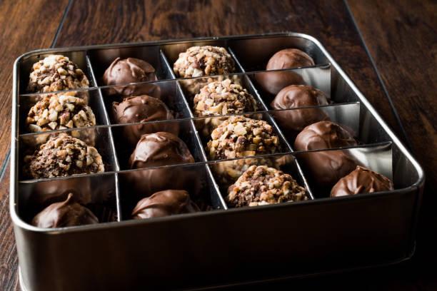istock Box of Chocolate Pralines with Hazelnuts. 871513146