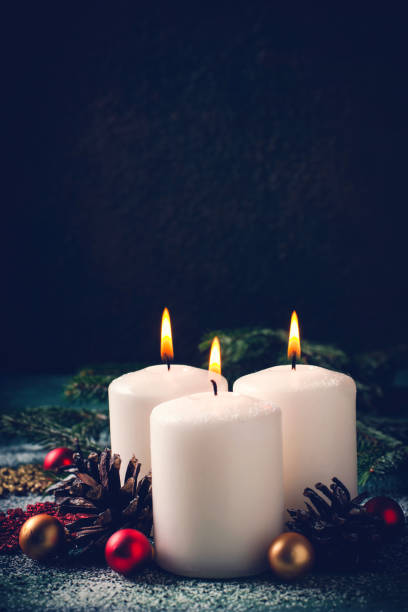 istock Christmas card with burning candles and decorations 871516926