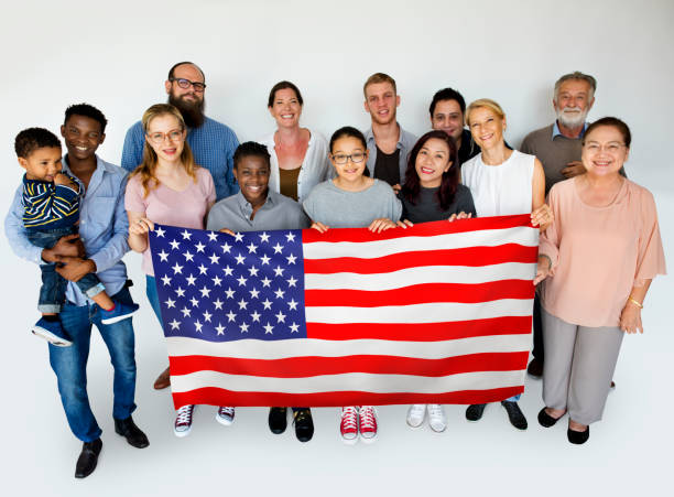 istock Happy people with the American flag 871518550