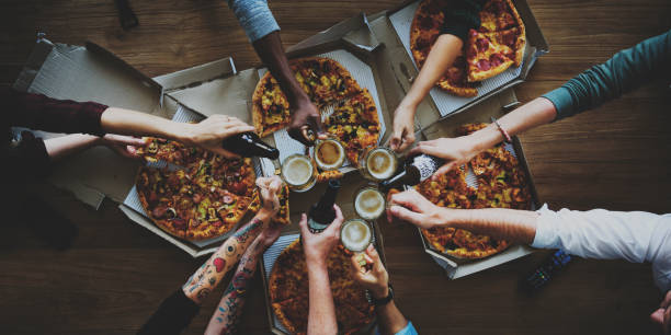 istock People Together Eat Pizza Drink Beers 871518808
