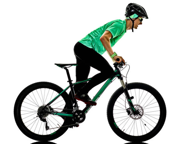 istock tenager boy  mountain bike bking isolated shadows 871525580
