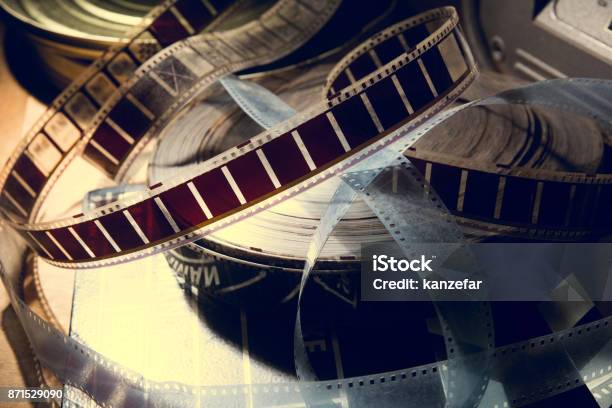 An Old Film With A Movie On The Roll Stock Photo - Download Image Now - Film Industry, Movie Theater, Movie