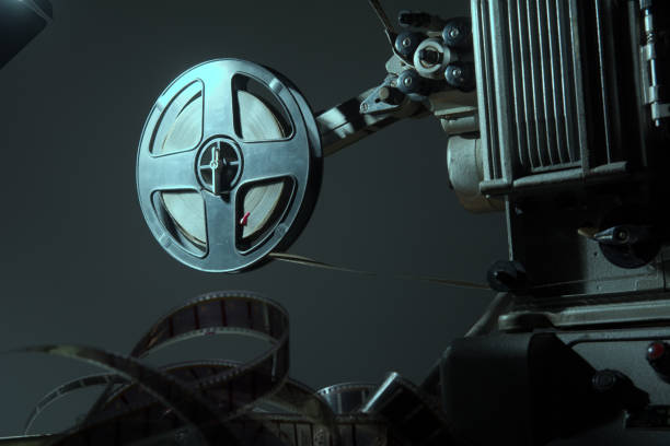 istock Coil with 16 mm film on the projector 871529102