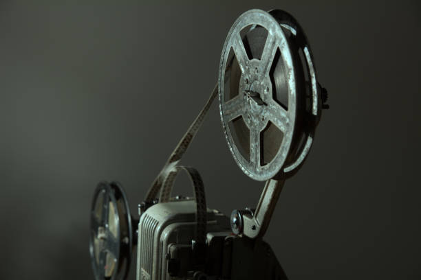 istock Coil with 16 mm film on the projector. 871529458