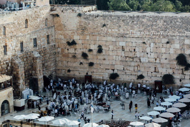 istock man  are praying in the western wall jerusalem. 871553240