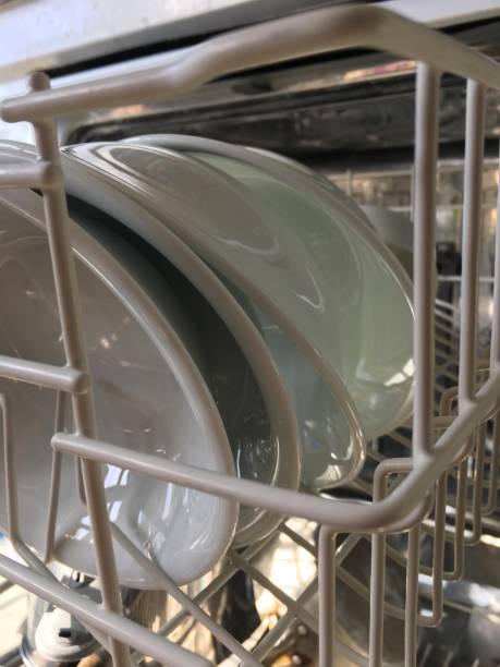 istock Dishwasher in A Commercial Kitchen 871564712