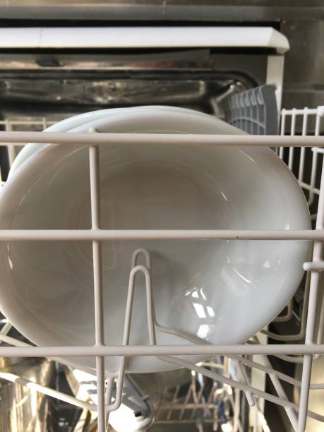 istock Dishwasher in A Commercial Kitchen 871564718