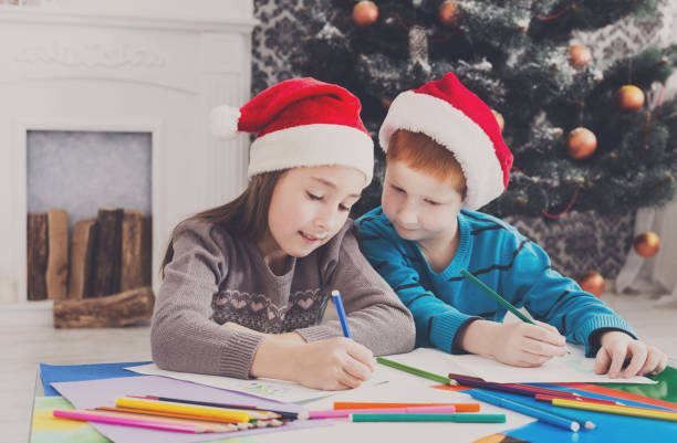 istock Children writing letter to santa, wait for christmas 871565344