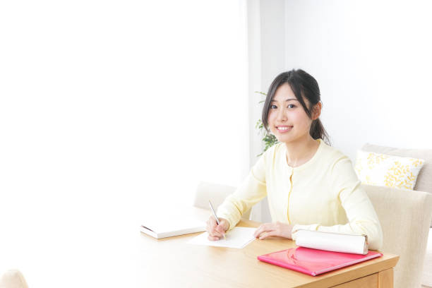 istock Young woman study at home 871565606