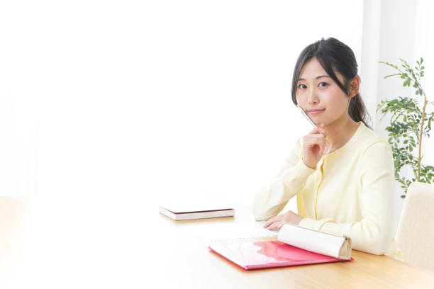 istock Young woman study at home 871565806