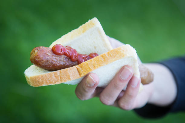 Sausage and Bread Australian barbecue food sausage and bread. sausage stock pictures, royalty-free photos & images