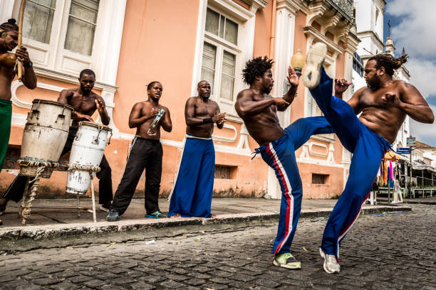 group of people playing capoeira in salvador, bahia, brazil - pelourinho imagens e fotografias de stock