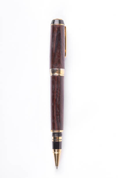 istock Brown ballpoint pen on white background. 871569724