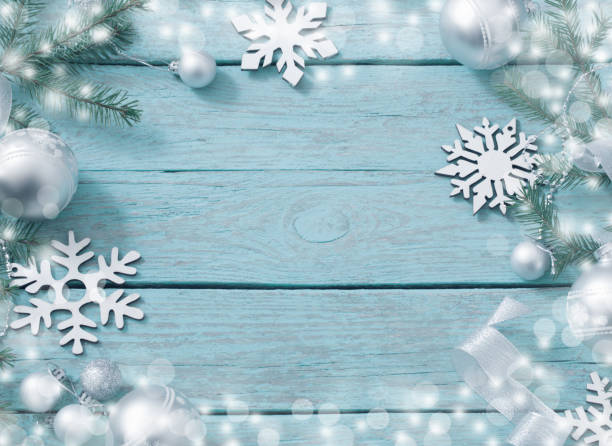 istock Christmas decoration on blue wooden background 871577528
