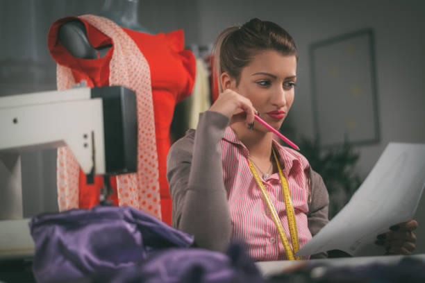 istock Young Fashion Designer At Work 871578212