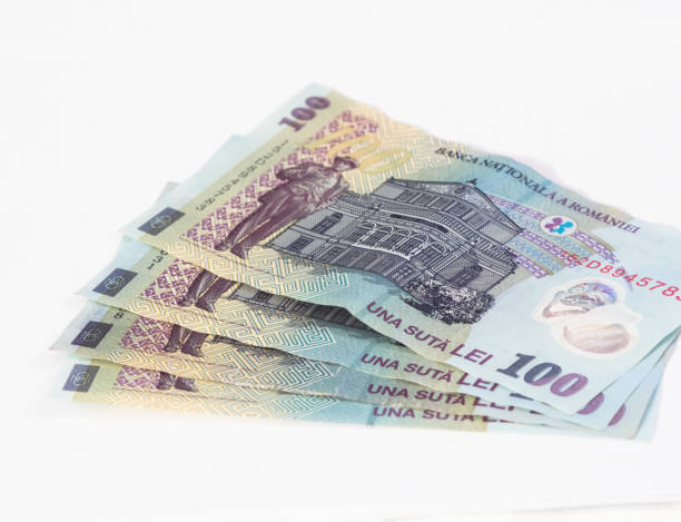 istock Four banknotes  worth 100 Romanian Lei isolated on a white background 871585844