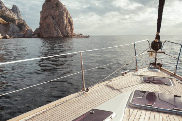 istock Yacht sailing in the tropical sea 871589422