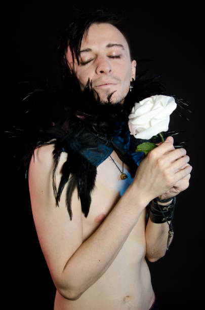 istock Halloween and gothic. Man raven on a black background. 871589598