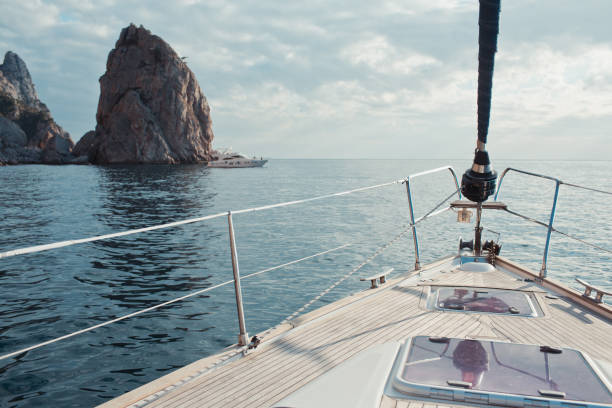 istock Yacht sailing in the tropical sea 871589644