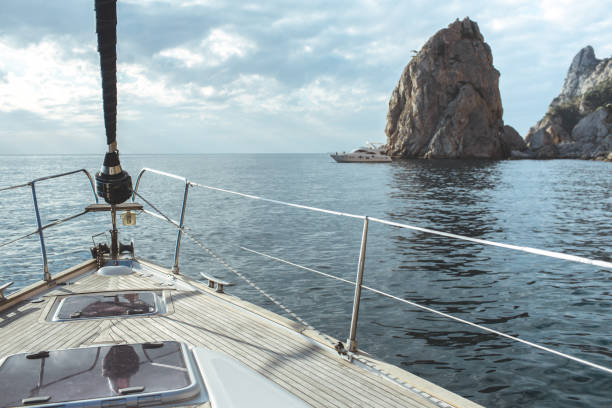 istock Yacht sailing in the tropical sea 871589752