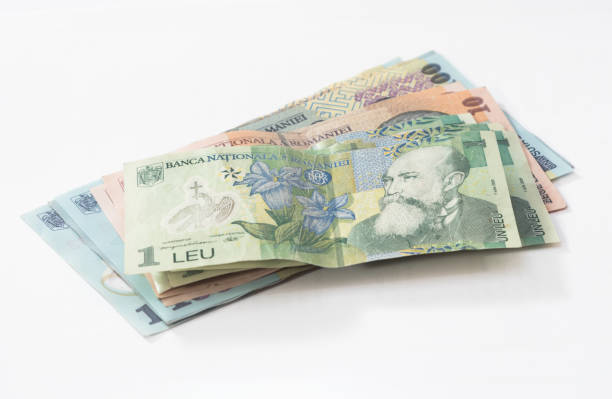 istock Several banknotes worth 100, 10 and 1 Romanian  Lei isolated on a white background 871592074