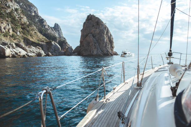 istock Yacht sailing in the tropical sea 871595116