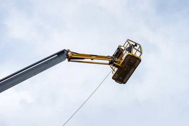 istock Cameraman on a crane, filming at a sporting event... 871602518