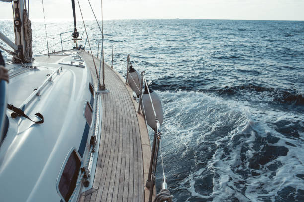 istock Yacht sailing in the tropical sea 871604788
