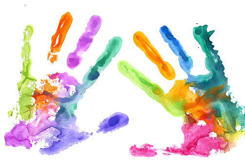 Multicolored hand prints on white background