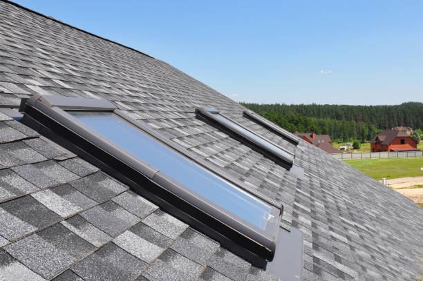 istock Attic skylight. Asphalt Shingles House Roofing Construction with Attic Roof windows, skylights waterproofing. 871605440