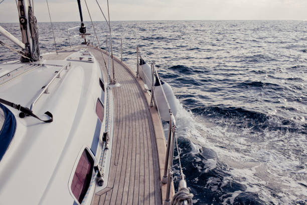 istock Yacht sailing in the tropical sea 871606096