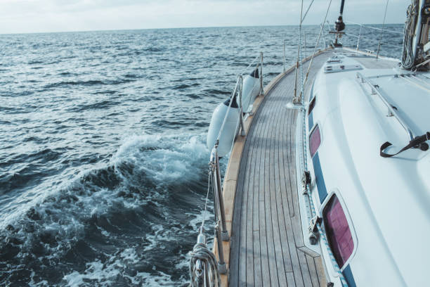 istock Yacht sailing in the tropical sea 871606588