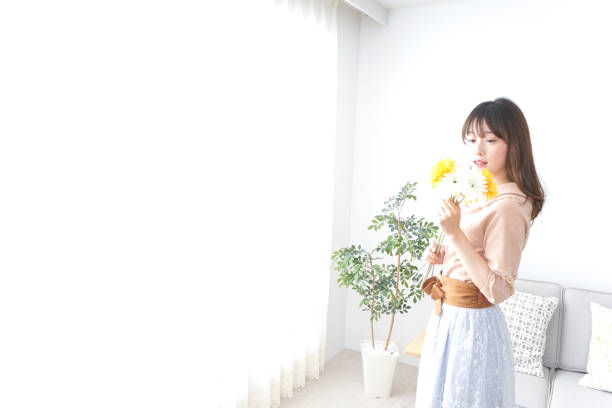 istock Young woman relaxing in the room 871609812