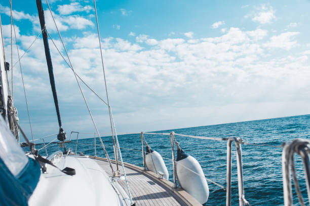 istock Yacht sailing in the tropical sea 871610434