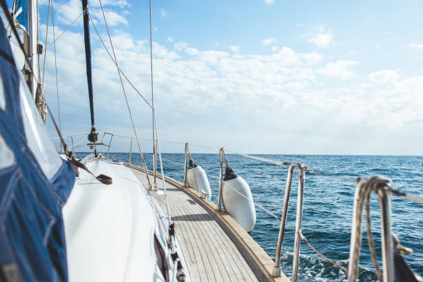 istock Yacht sailing in the tropical sea 871610758