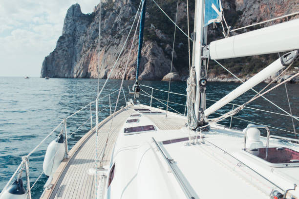 istock Yacht sailing in the tropical sea 871617372