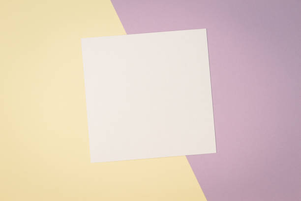 istock Blank white card on colorful background with copy space 871617548
