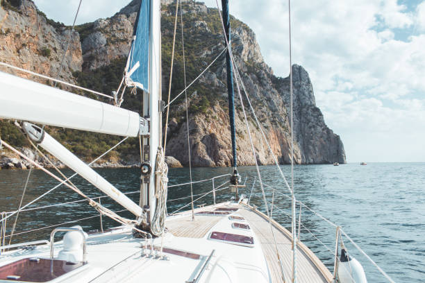 istock Yacht sailing in the tropical sea 871617792