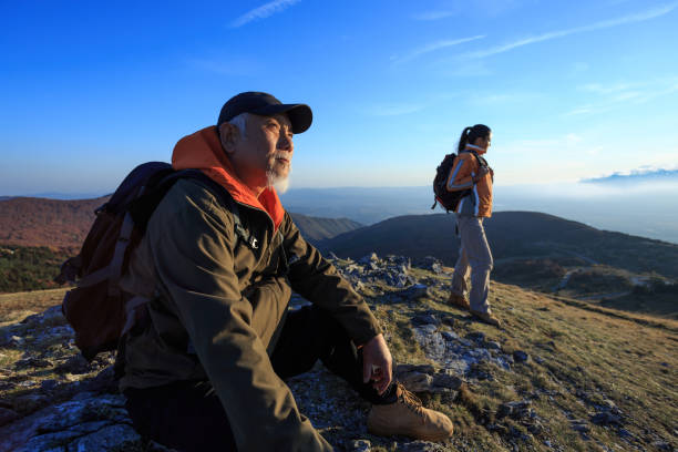 istock Father and daughter exploring the mountains 871620960