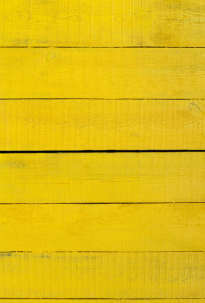 istock Yellow natural painted wood texture and background. 871621696