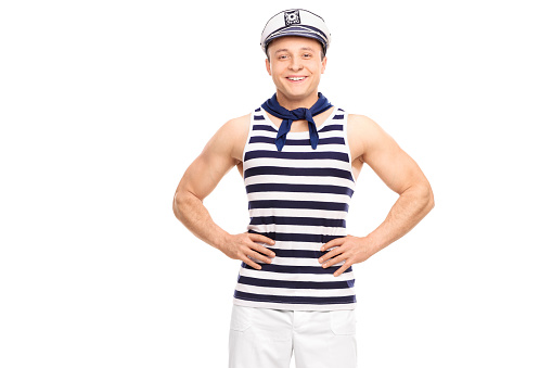 Young man dressed in a sailor outfit isolated on white background