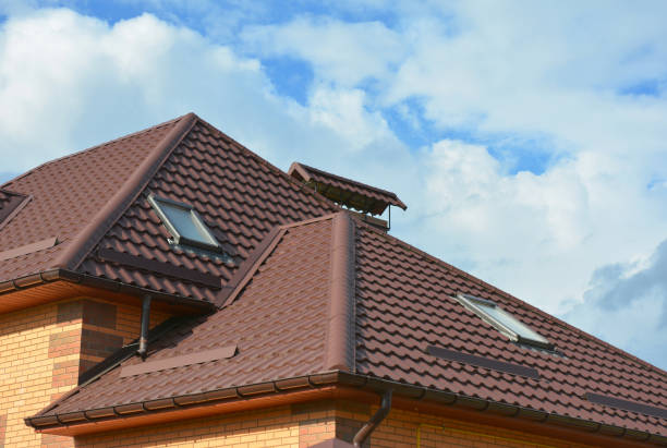 istock Roofing construction with attic skylights, rain gutter system, roof windows, metal snow guard and guttering. 871633310